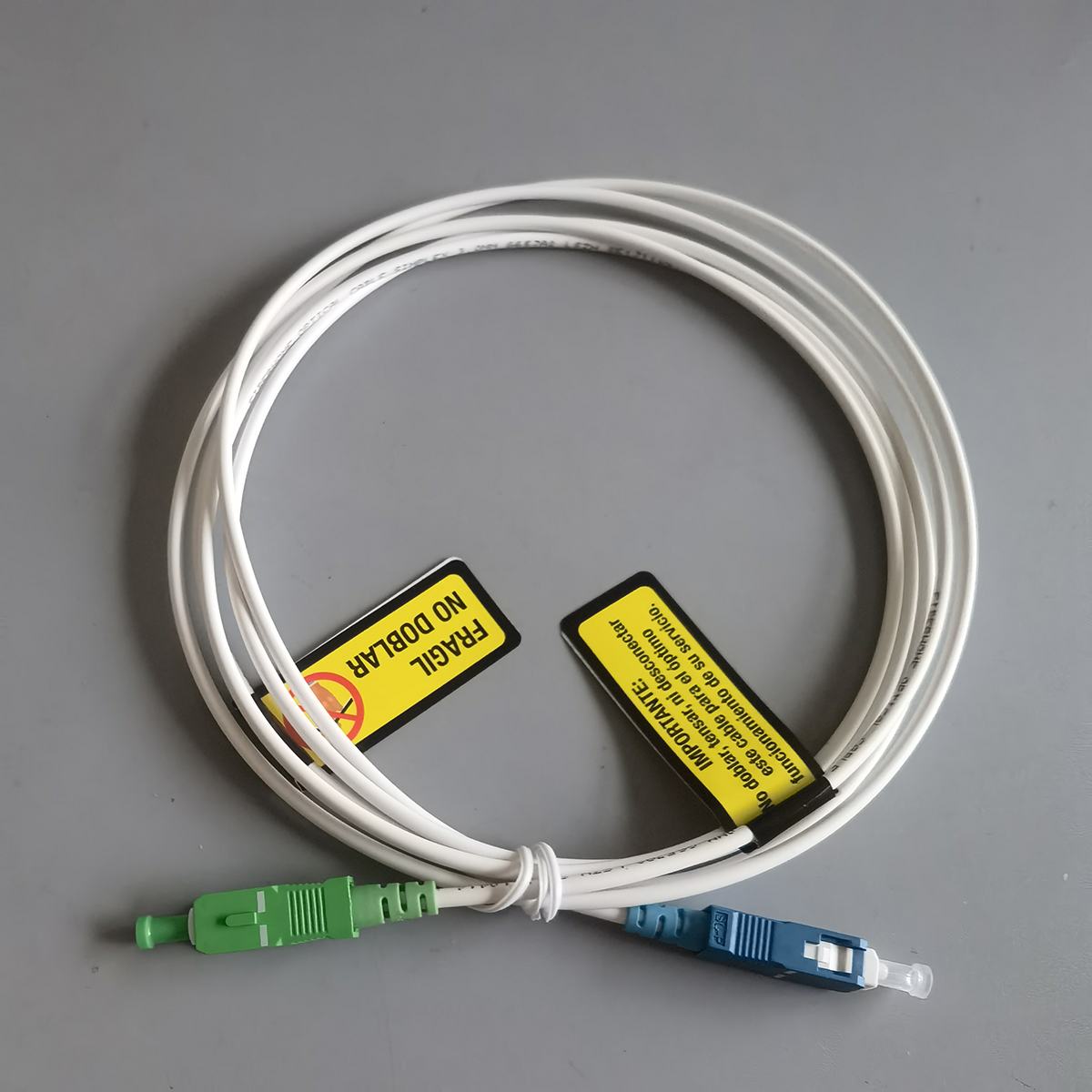 FTTH Fiber Optic Cable SC APC to SC UPC 2M G657A2 Single Mode Simplex 3.0mm Indoor Patch Cord Ready FTTH Fiber Optic Cable SC APC to SC UPC 2M G657A2 Single Mode Simplex 3.0mm Indoor Patch Cord Ready