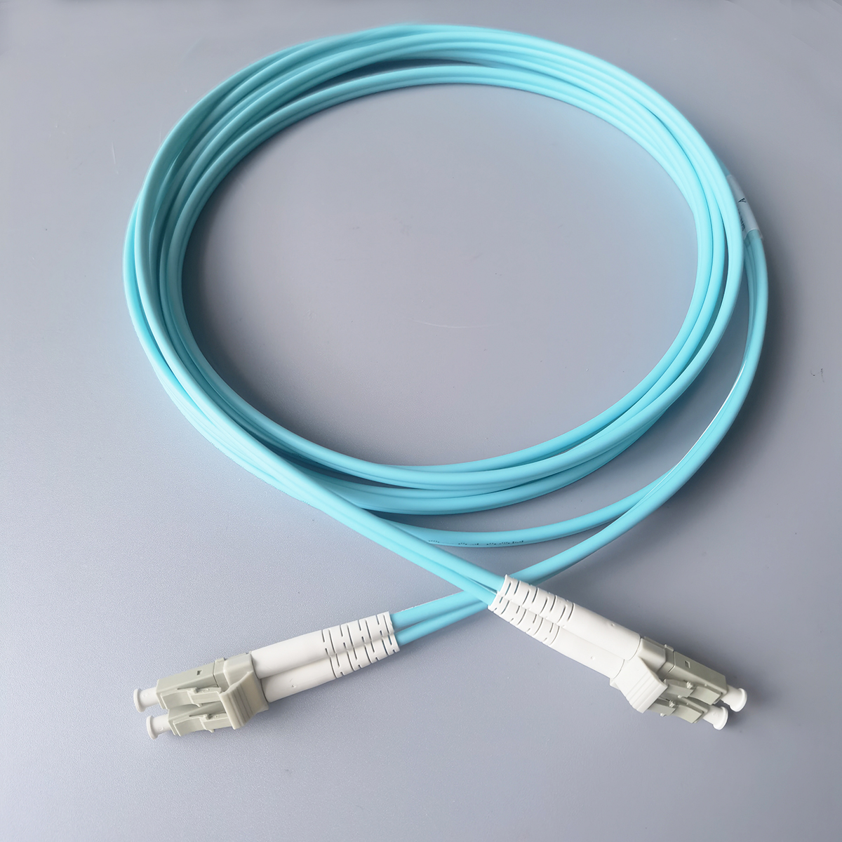FTTH LC UPC to LC UPC OM3 Fiber Optic Cable 10Gbps Multimode Duplex 2.0mm Jumper for Data Center FTTH LC UPC to LC UPC OM3 Fiber Optic Cable 10Gbps Multimode Duplex 2.0mm Jumper for Data Center