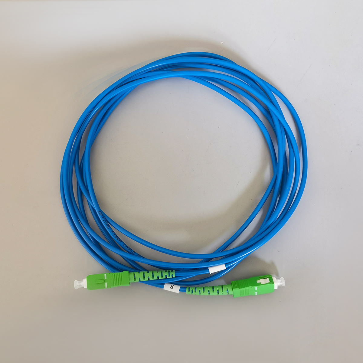 FTTH 3M SC/APC to SC/APC Single Mode Fiber Optic Patch Cable G652D Indoor Blue Fiber Optic Cable FTTH 3M SC/APC to SC/APC Single Mode Fiber Optic Patch Cable G652D Indoor Blue Fiber Optic Cable