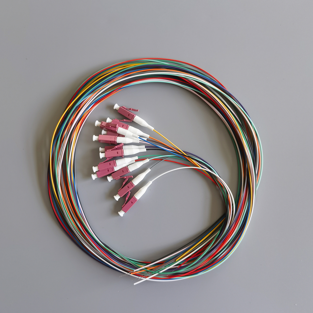 FTTH 12 Colors OM4 Fiber Optic Pigtail 2M LC/UPC Multi-Mode Indoor 0.9mm Optical Fiber Tail Cable FTTH 12 Colors OM4 Fiber Optic Pigtail 2M LC/UPC Multi-Mode Indoor 0.9mm Optical Fiber Tail Cable