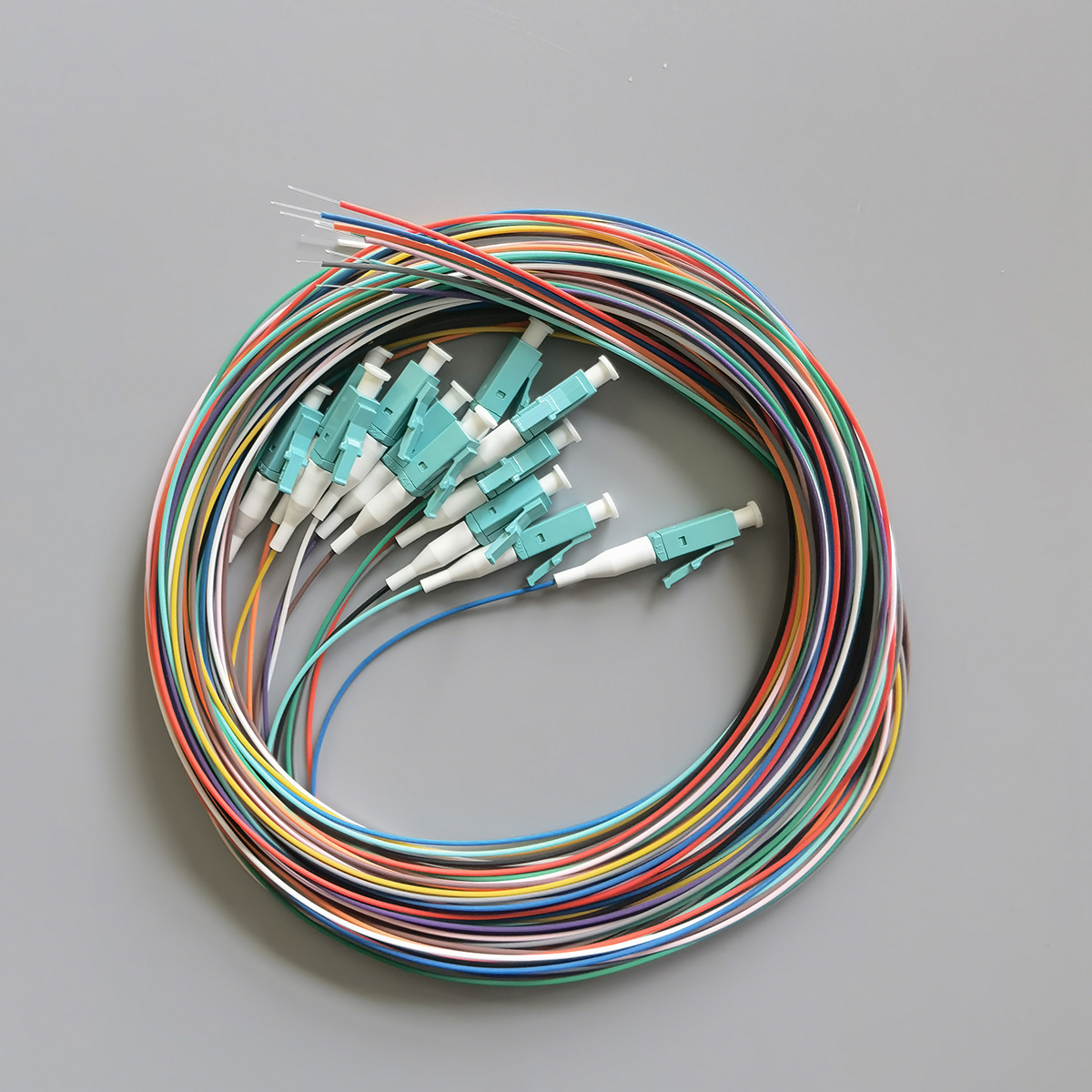 FTTH OM3 LC Aqua Multimode Fiber Optic Pigtail Cable 0.9mm LSZH for Telecom and Data Center FTTH OM3 LC Aqua Multimode Fiber Optic Pigtail Cable 0.9mm LSZH for Telecom and Data Center