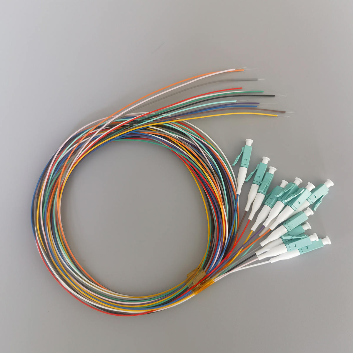 FTTH OM3 LC Aqua Multimode Fiber Optic Pigtail Cable 0.9mm LSZH for Telecom and Data Center