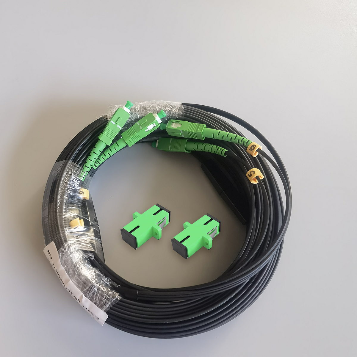 FTTH Outdoor Drop Fiber Optic Patch Cord SC APC to SC APC Single Mode Dual Core Waterproof Cable FTTH Outdoor Drop Fiber Optic Patch Cord SC APC to SC APC Single Mode Dual Core Waterproof Cable