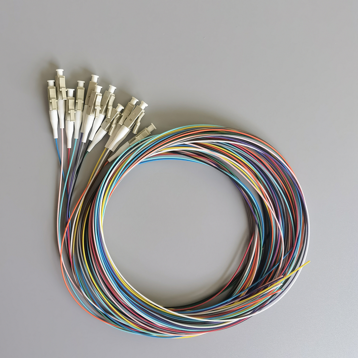 FTTH OM2 Fiber Optic Pigtail LC UPC Multimode 50/125μm 0.9mm 2m 12 Colors Indoor Cable High Quality FTTH OM2 Fiber Optic Pigtail LC UPC Multimode 50/125μm 0.9mm 2m 12 Colors Indoor Cable High Quality