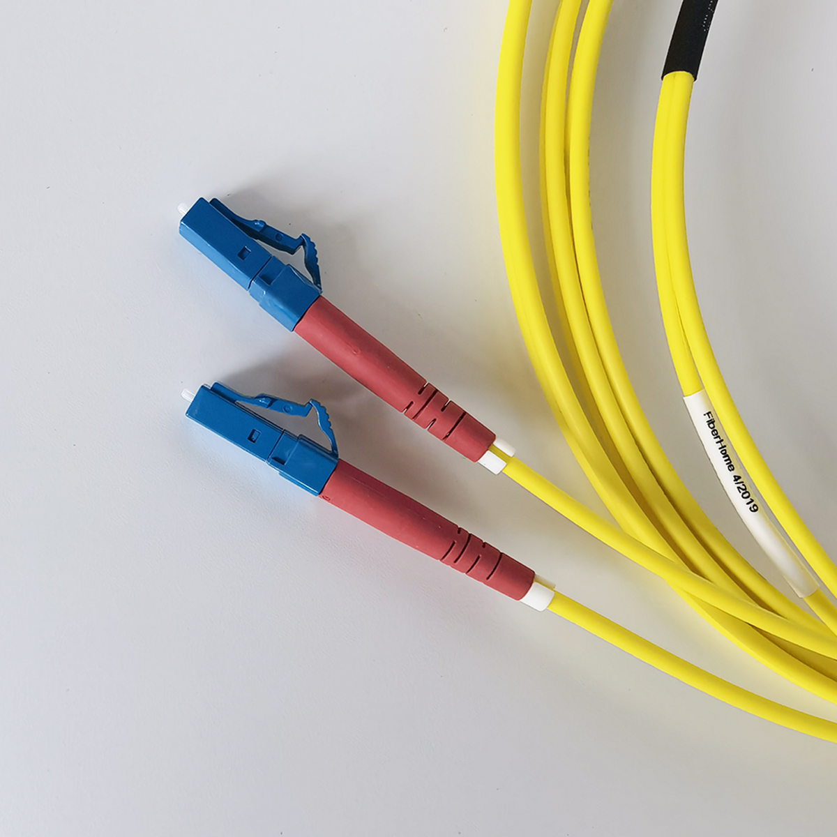 FTTH Fiber Optic Cable LC/UPC to SC/APC 3mm 2M Single Mode Duplex Optical Indoor Extension Cable FTTH Fiber Optic Cable LC/UPC to SC/APC 3mm 2M Single Mode Duplex Optical Indoor Extension Cable