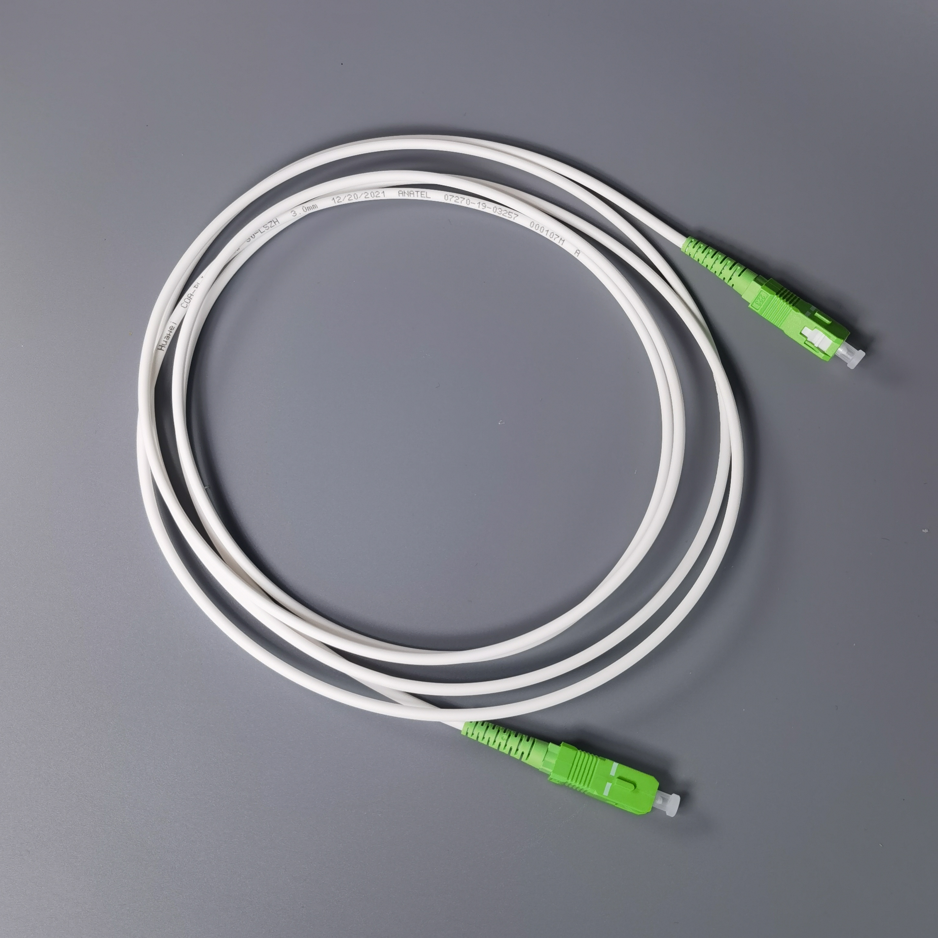 FTTH Fiber Optic Patch Cord SC/APC to SC/APC Single Mode Simplex G657A2 LSZH 2M White Internet Cable FTTH Fiber Optic Patch Cord SC/APC to SC/APC Single Mode Simplex G657A2 LSZH 2M White Internet Cable