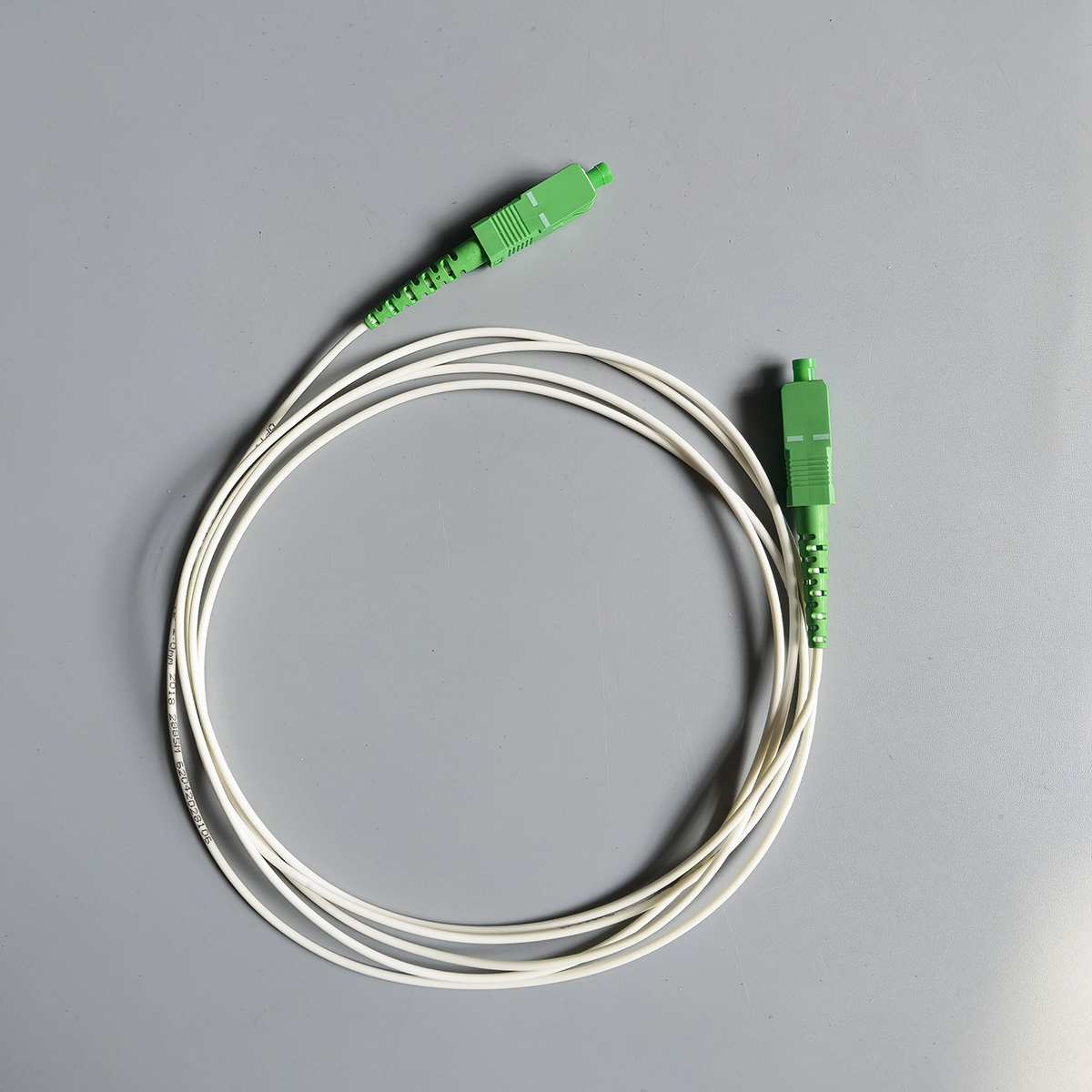 FTTH SC APC to SC APC 2.0mm LSZH Fiber Optic Cable Durable Indoor Use High-Speed Low-Loss FTTH SC APC to SC APC 2.0mm LSZH Fiber Optic Cable Durable Indoor Use High-Speed Low-Loss