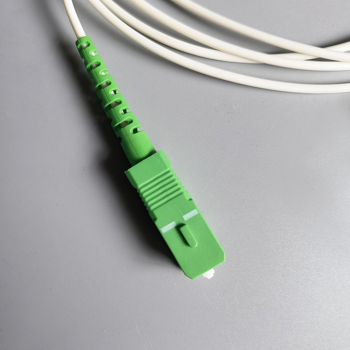 FTTH SC APC to SC APC 2.0mm LSZH Fiber Optic Cable Durable Indoor Use High-Speed Low-Loss FTTH SC APC to SC APC 2.0mm LSZH Fiber Optic Cable Durable Indoor Use High-Speed Low-Loss
